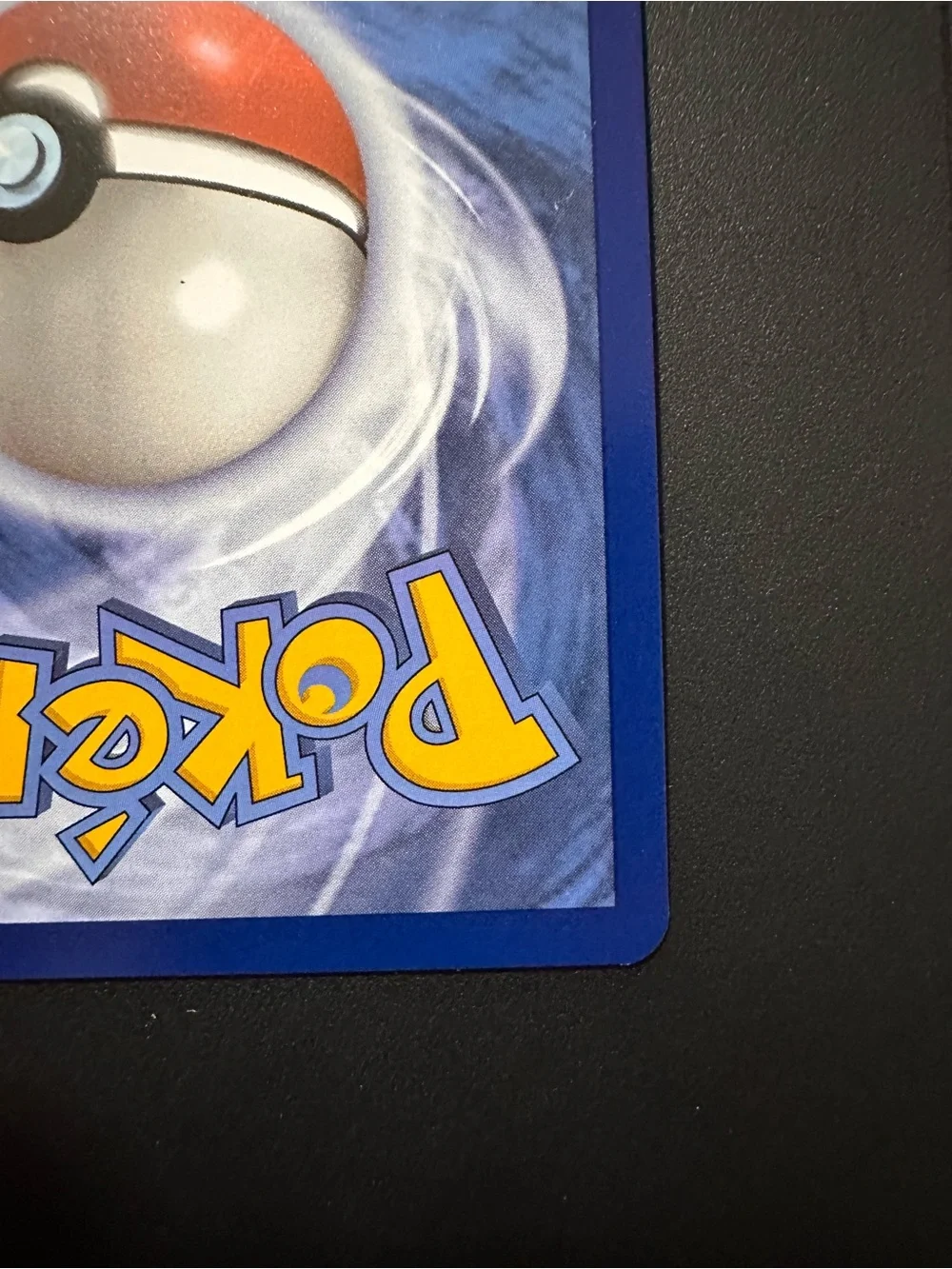Pokemon card being